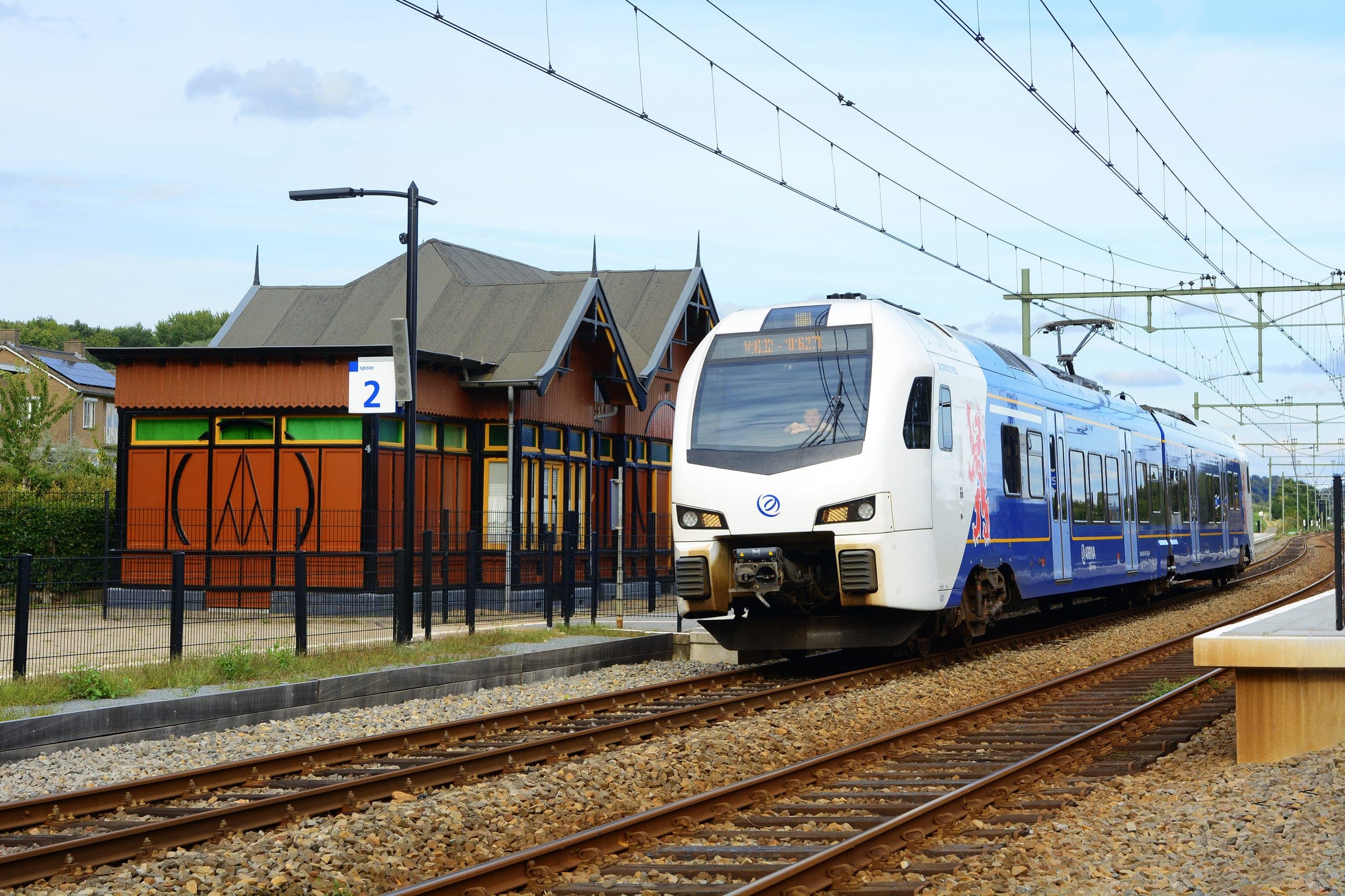 An Arriva Stadler FLIRT train stops at Houthem-Sint Gerlach station between Maastricht and Valkenburg.