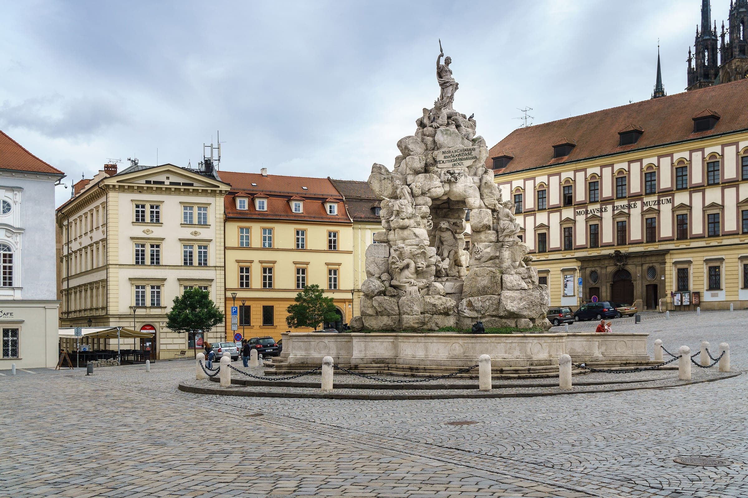 The Baroque Parnas fountain rises from the cobbled middle of Zelný trh in Brno's old town.