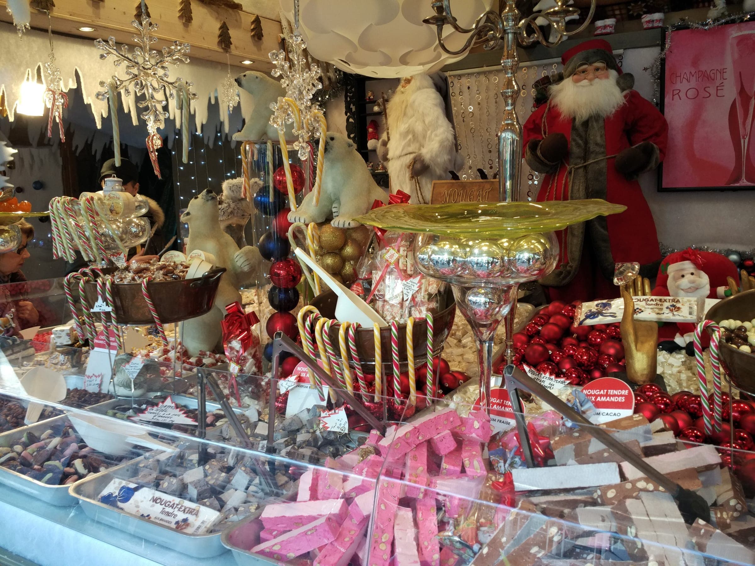 Nougat, chocolate and sugared sweets fill the counter of a chalet at the Montreux Christmas market