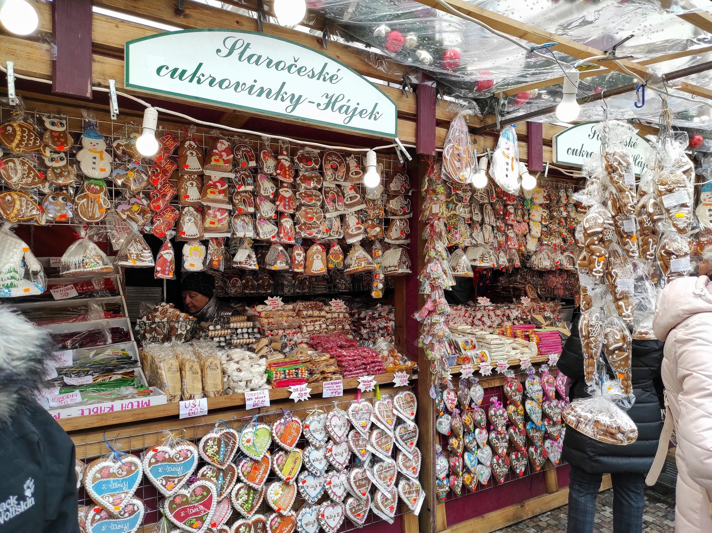 Iced gingerbread hearts and figures hang in a stall at the náměstí Republiky market in Prague.