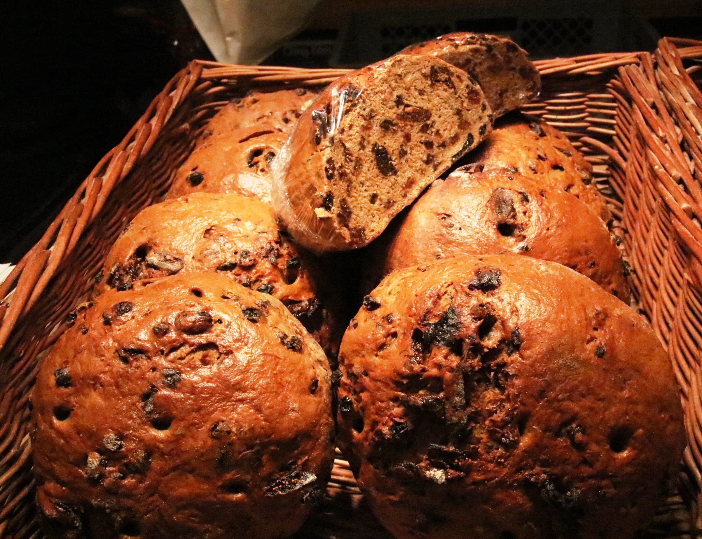 Loaves of fruit bread studded with nuts sit in a basket at the Hellbrunn Advent market