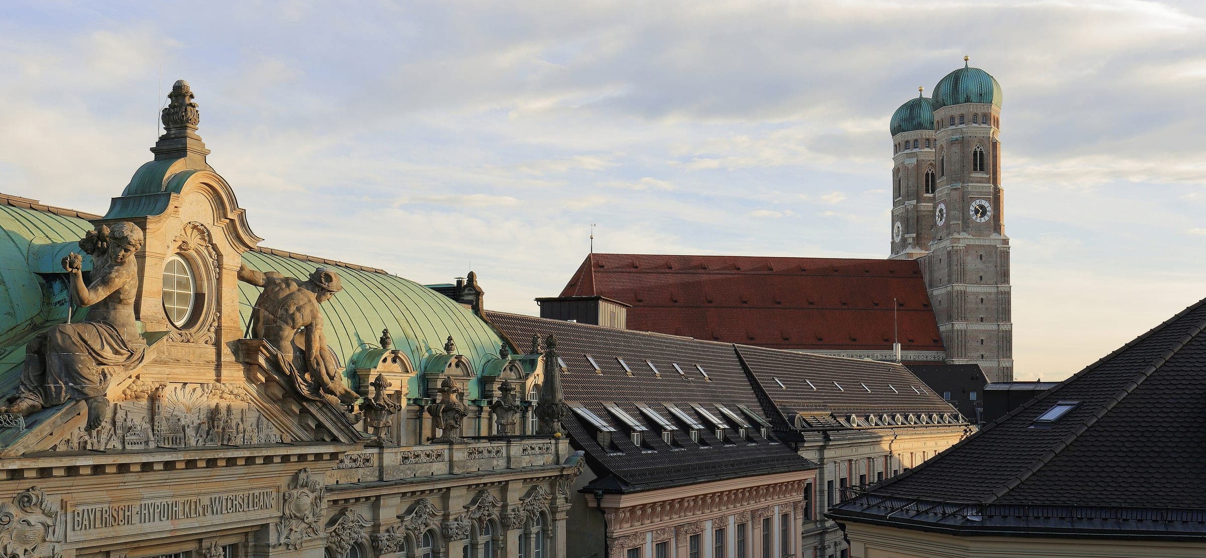 The twin domed towers of the Frauenkirche rise over the rooftops of Munich's old town.