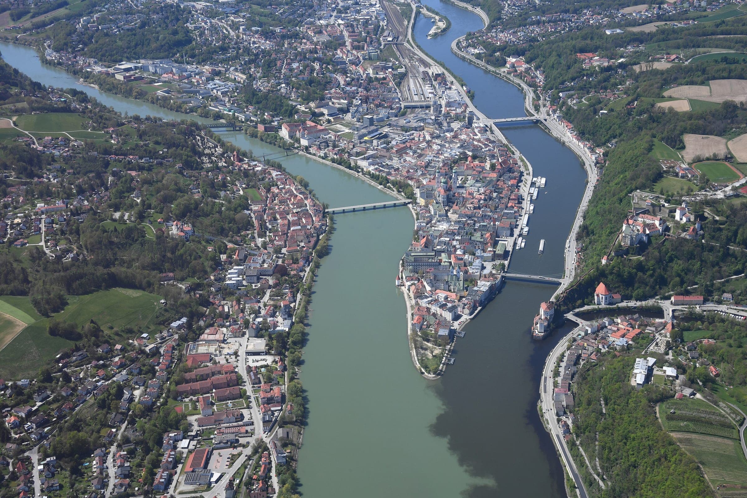 From the air the old town of Passau runs to a point where the Inn and the Danube meet.