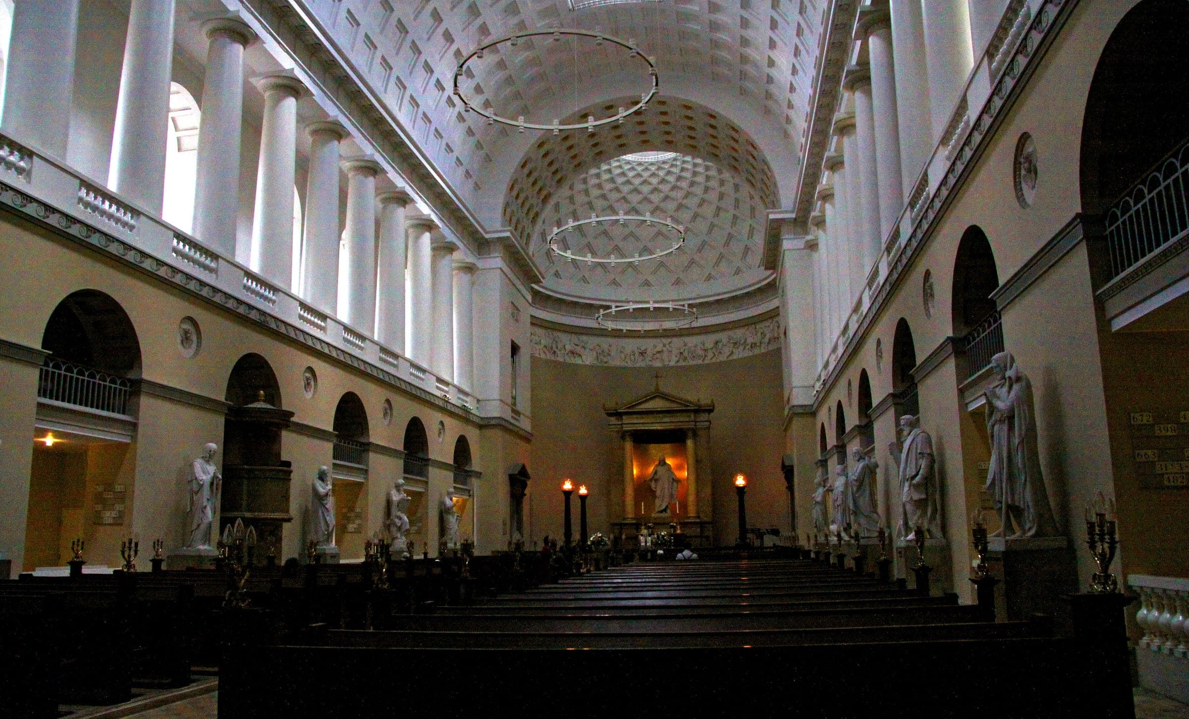Thorvaldsen's marble apostles line the coffered nave of Copenhagen Cathedral down to the statue of Christ.
